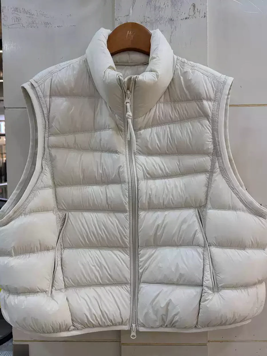 Women's channel-quilted stand-collar down vest · 98059