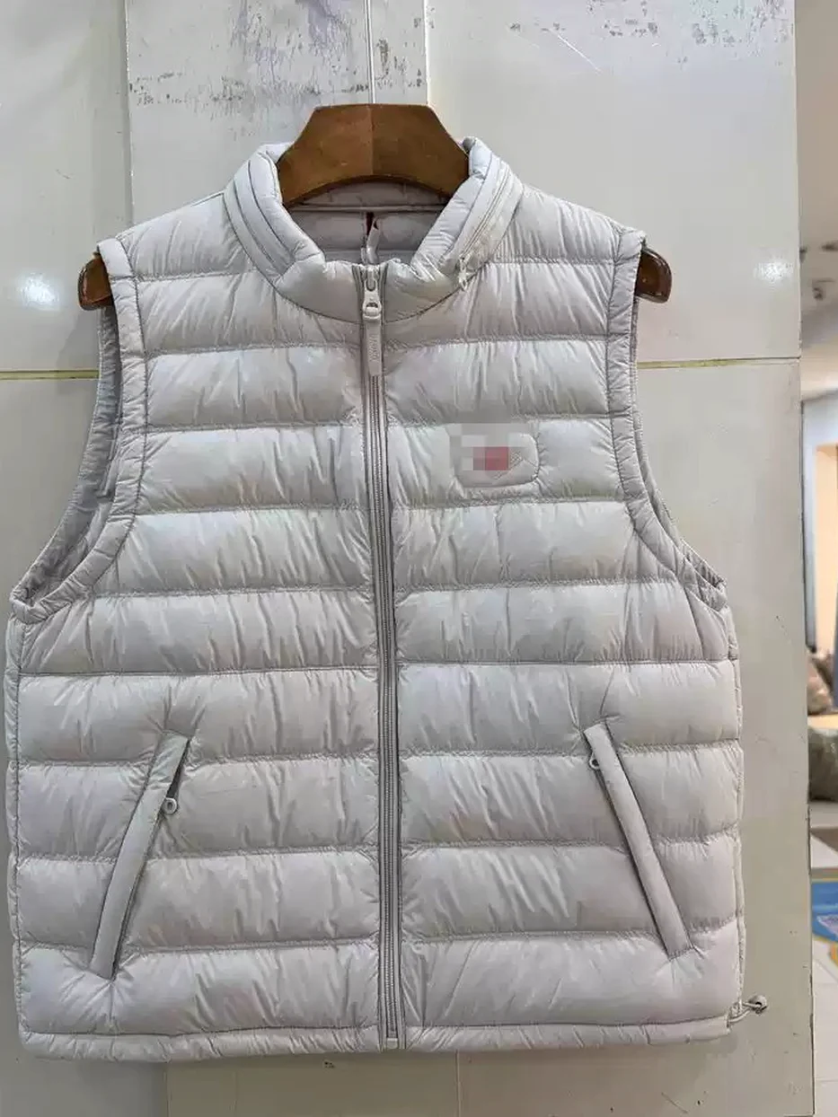 Women's channel-quilted diamond-quilted down vest · 98059