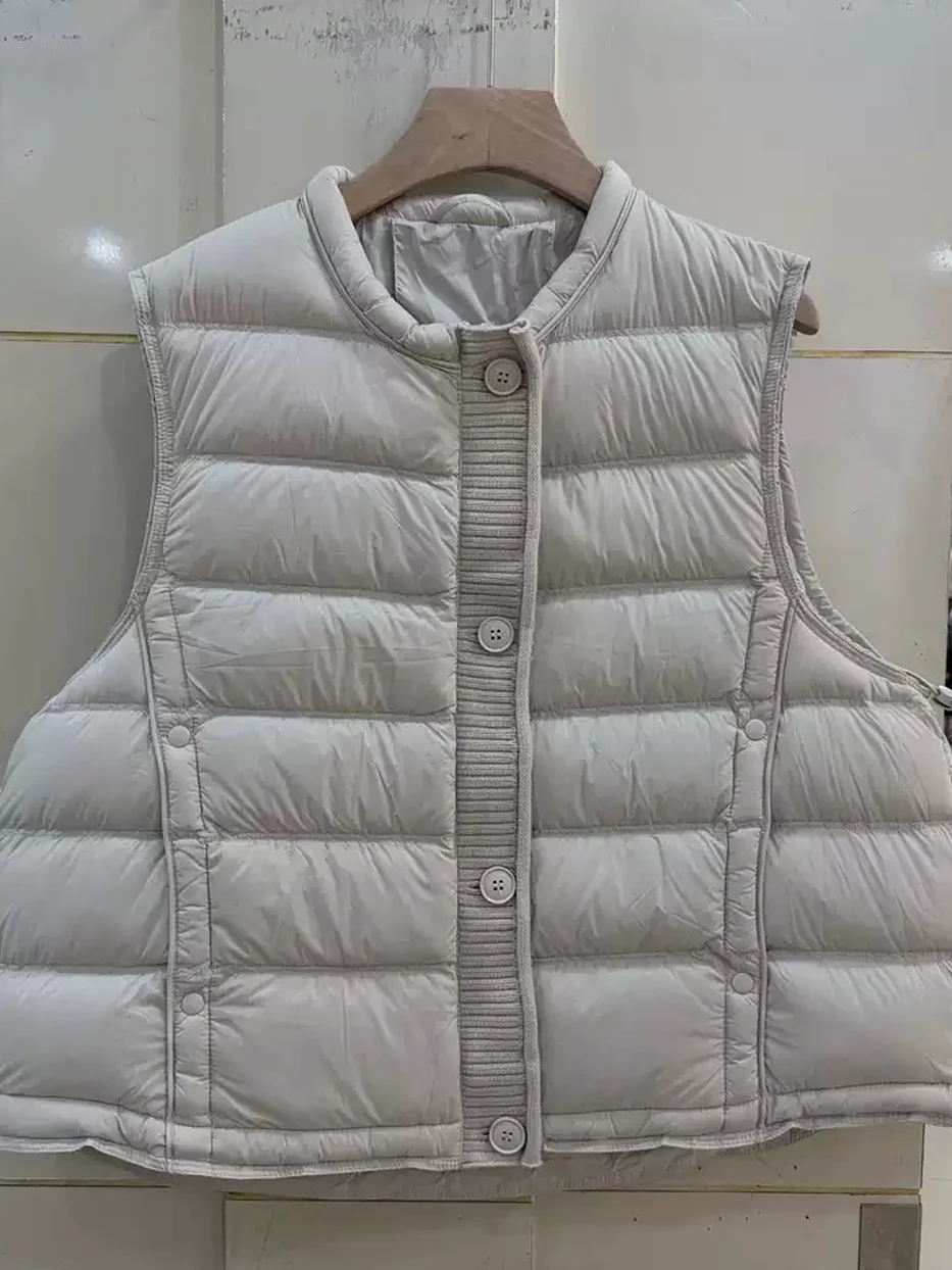 Women's panelled single-breasted down vest · 98059