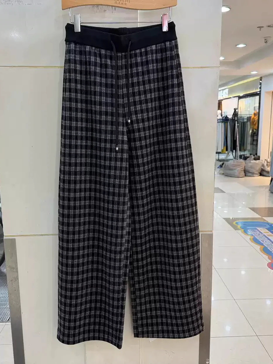 Women's checked elastic-waist trousers · 98059