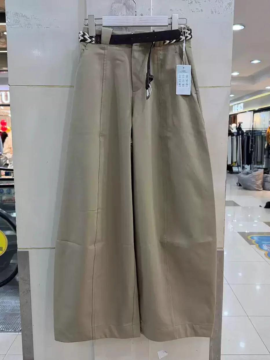Women's belted curved-leg trousers · 98059