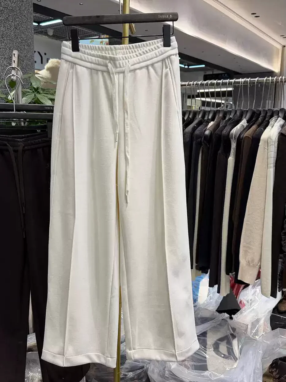 Women's drawstring elastic-waist heavyweight black trousers · 98059