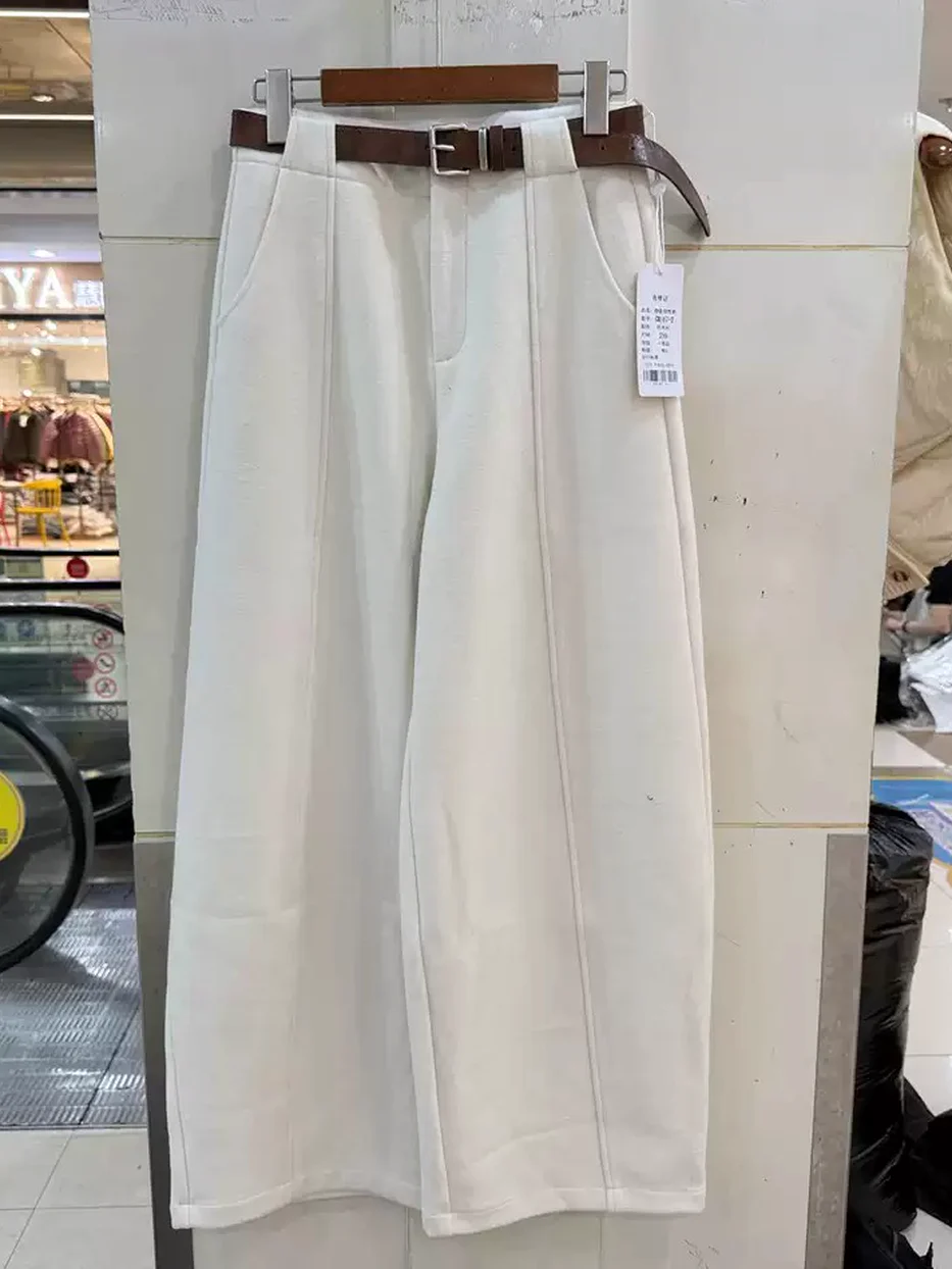Women's belted wool curved-leg trousers · 98059